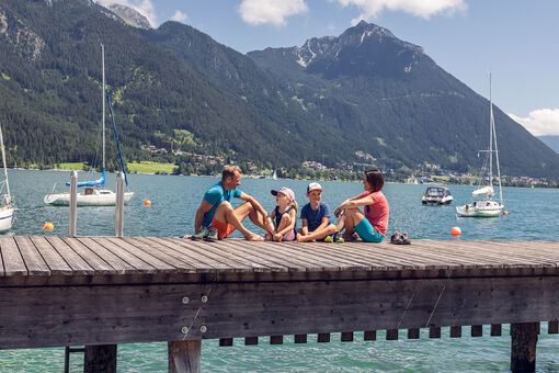 Family outing to the lakeshore promenade in Pertisau, gorgeously backdropped by the Ebner Joch.
